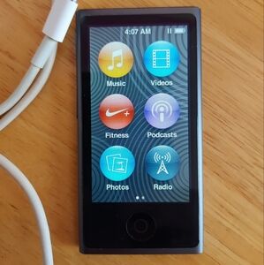 Apple iPod Nano 7th Generation 16 Gig Slate In Color With Apple Charger.
